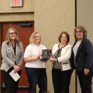 Resilient Community designation and plaque presented to facilitating team members from Codington County.